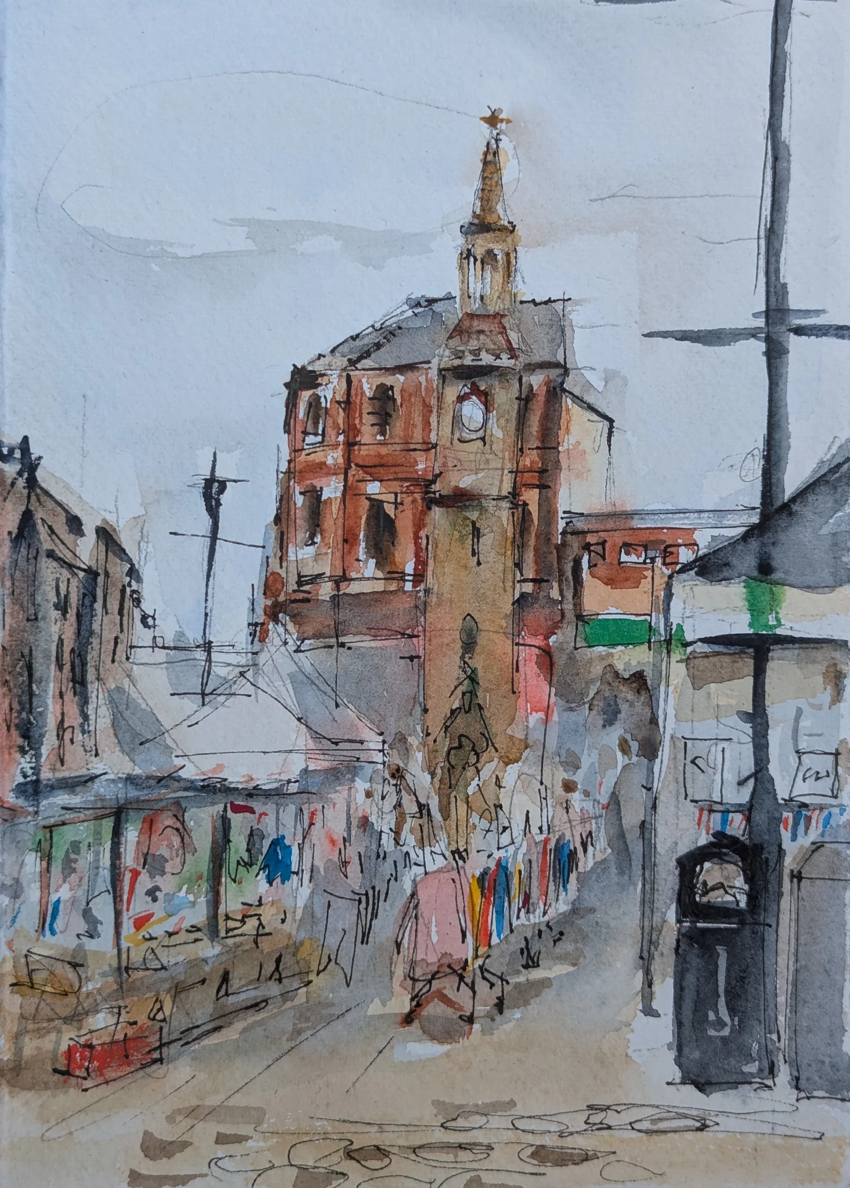 Ink and watercolour: Market stalls lead towards Ormskirk Clock Tower, drawn in ink and watercolour.
