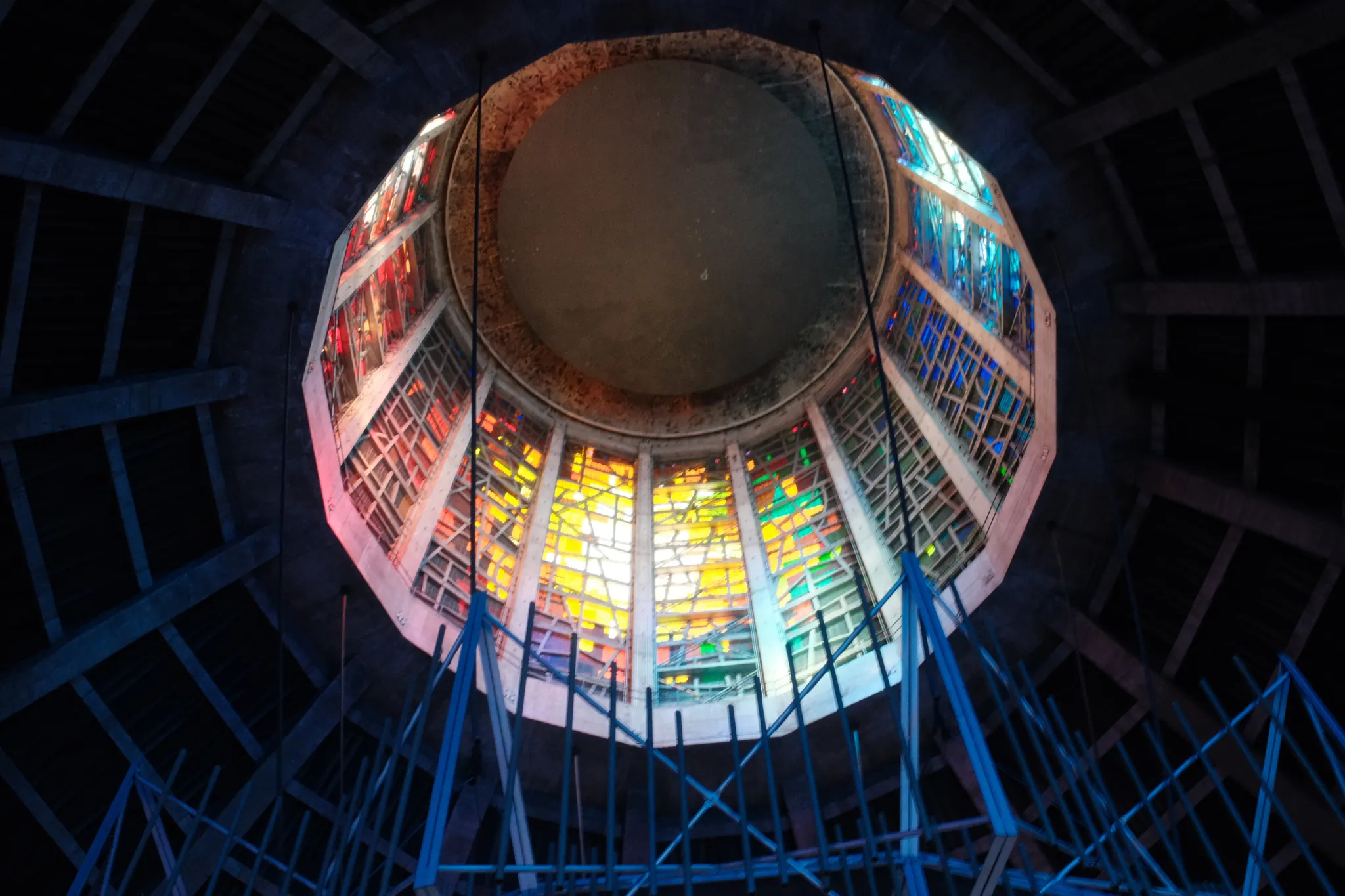 Coloured glass encircles the lantern of Liverpool Metropolitan Cathedral, seen from below.