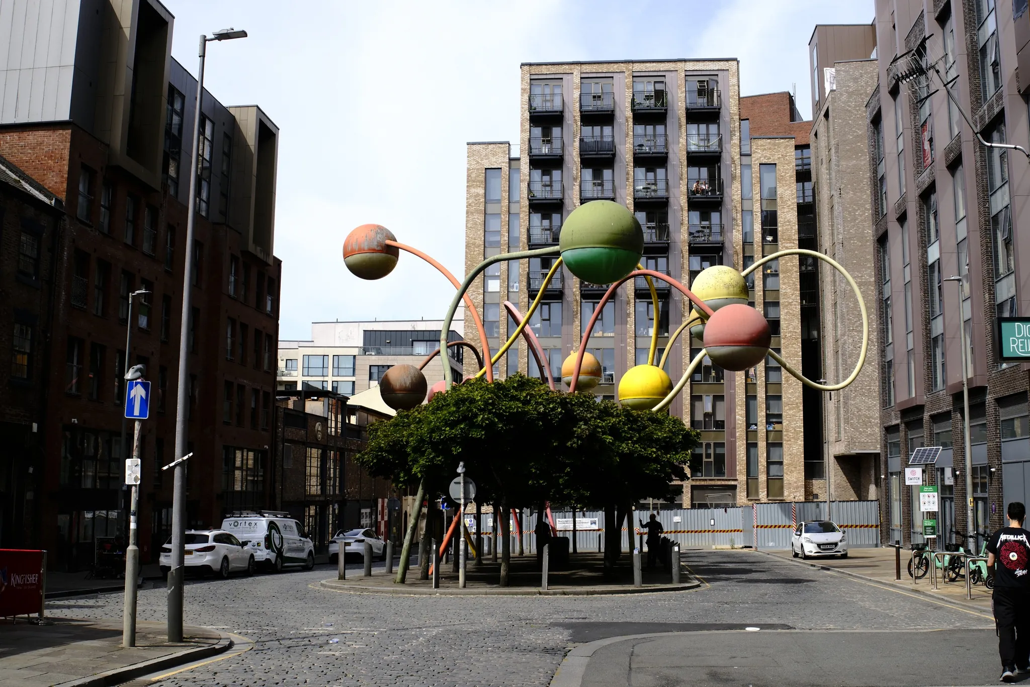 Jorge Pardo’s Penelope spreads colourful spheres and curved metal stems across Wolstenholme Square.