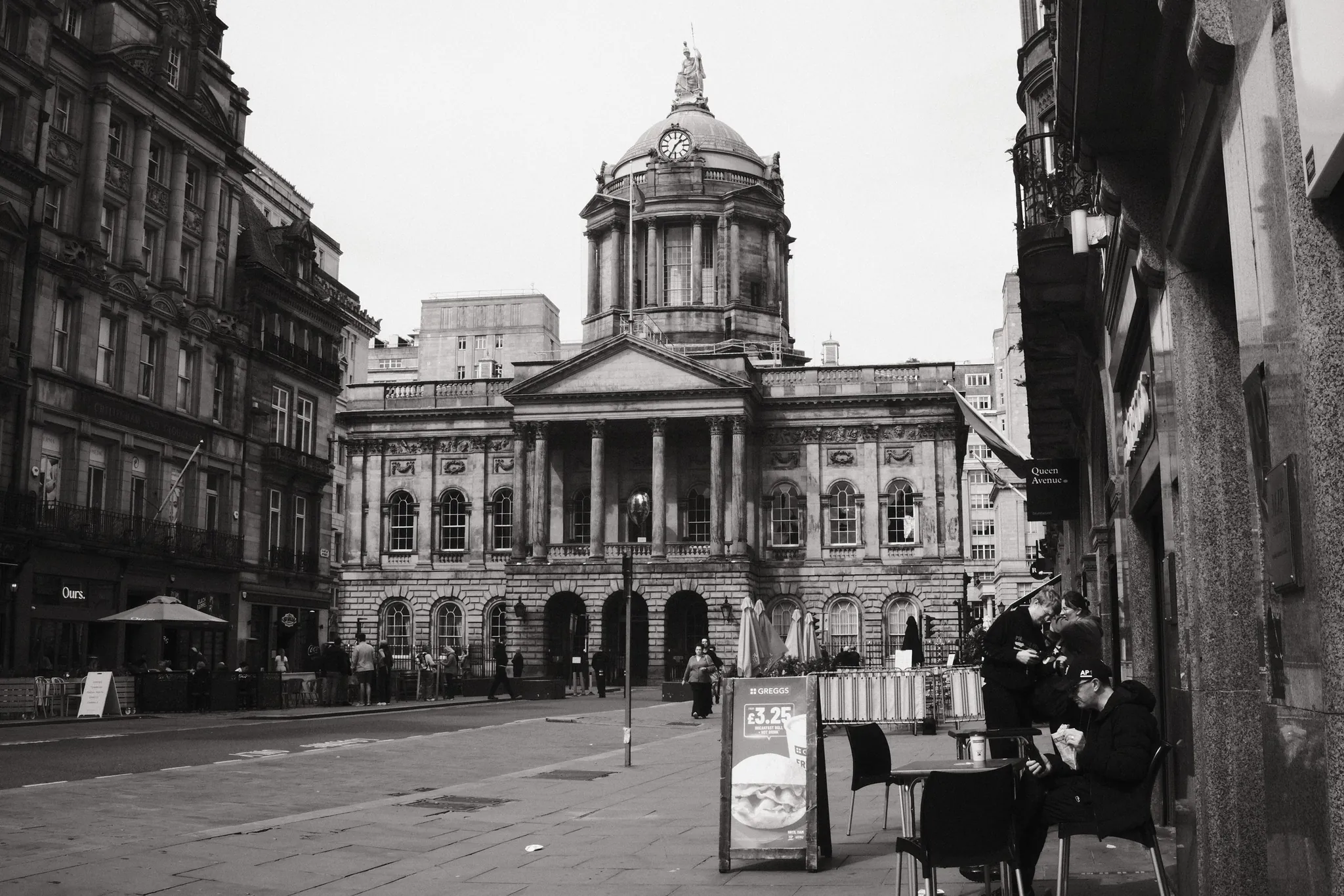 Liverpool Town Hall’s dome and stone façade close the view along Castle Street.